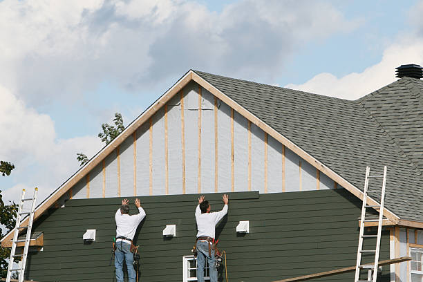 Professional Siding Installation technician working in Railroad, PA